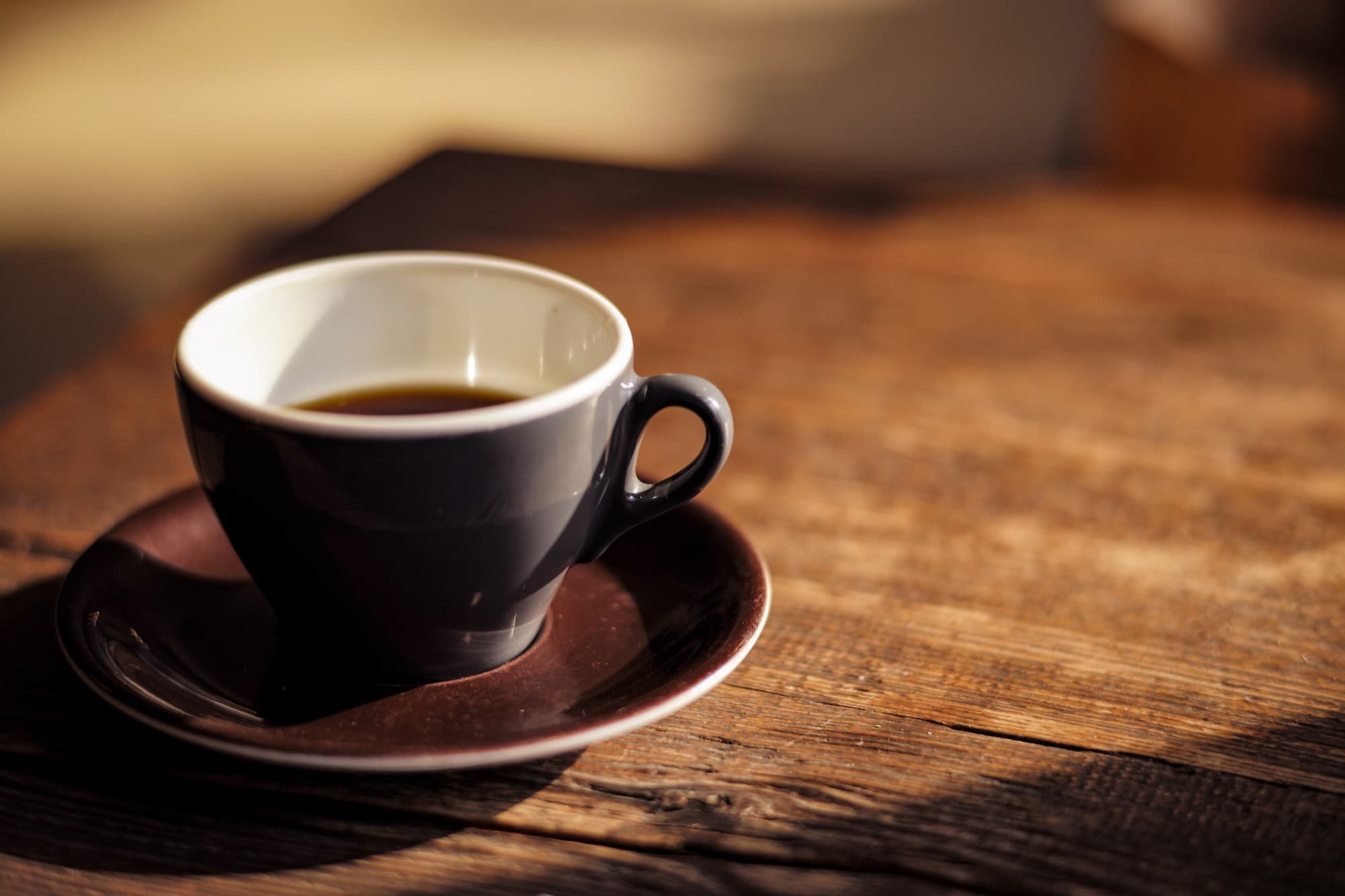 A cup of coffee on a table