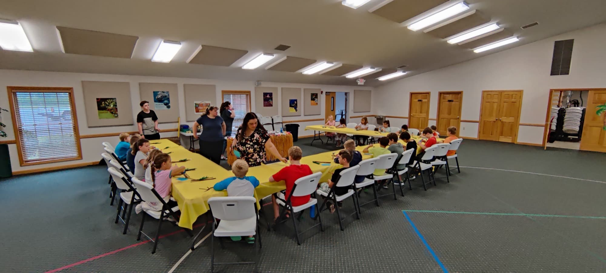 The fellowship hall set with tables for a church activity
