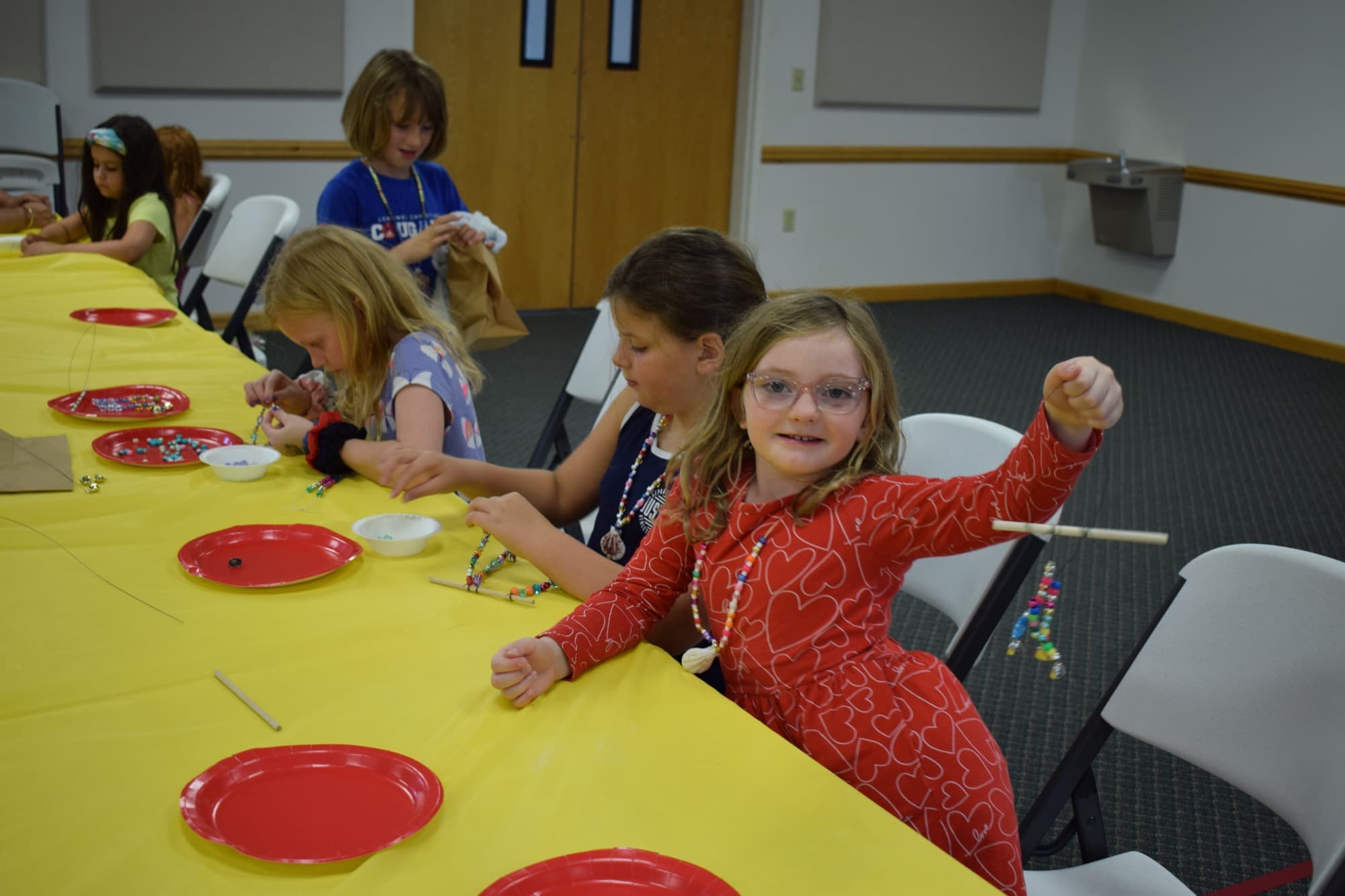 Children working on a craft during Vacation Bible School