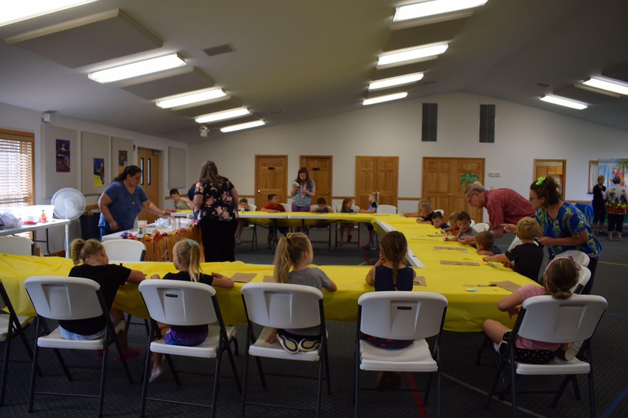 Children at the craft tables during Vacation Bible School