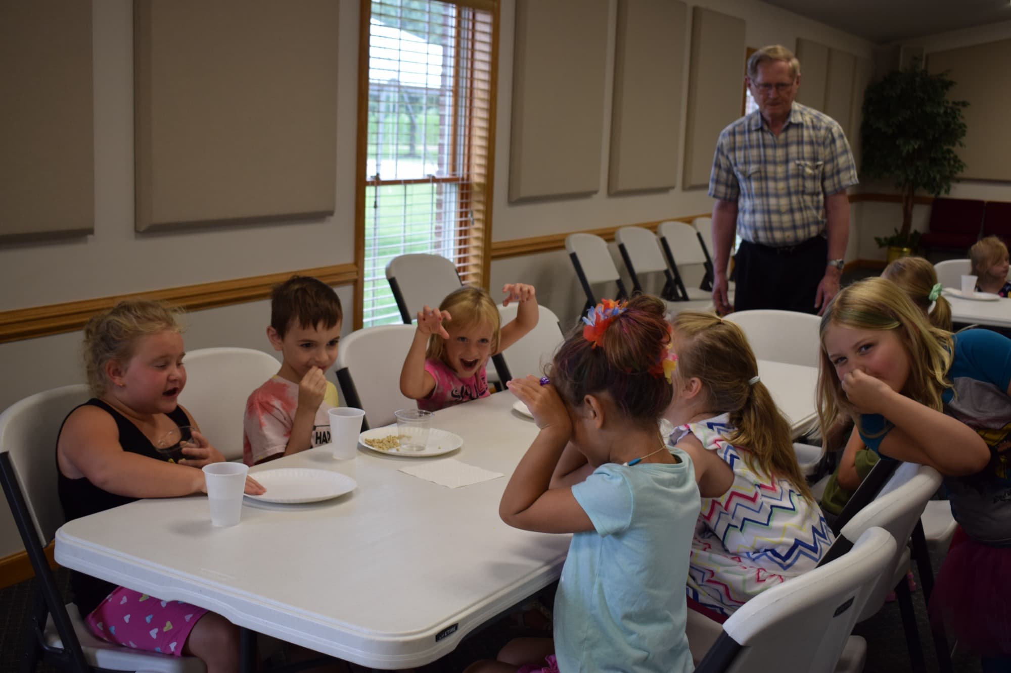Children at a table during Vacation Bible School